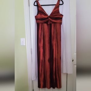 NWT  Size 14 Ronni Nicole long dress with rust and gold tones.